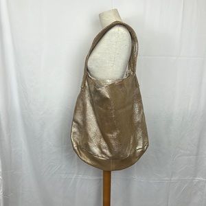 Boho Leather gold metallic shoulder bag very roomy on the inside $60